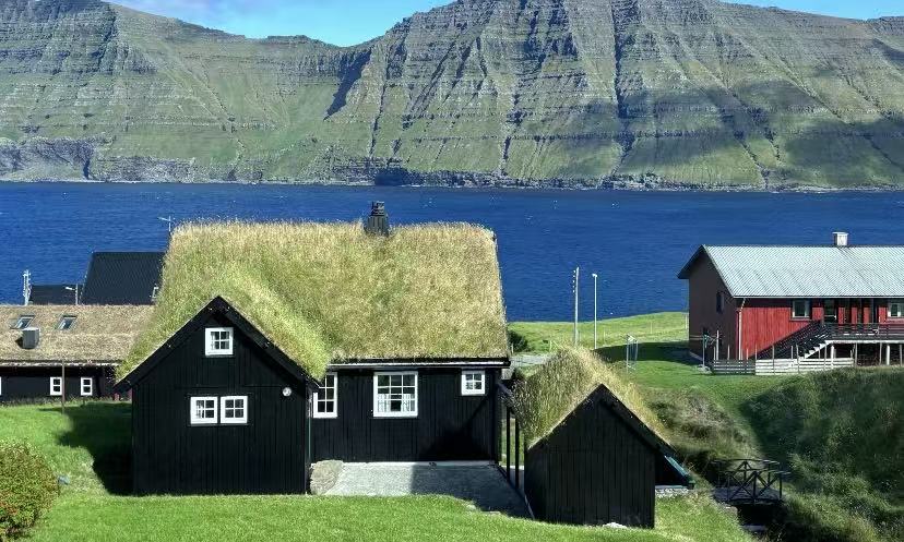 Faroe Islands: Cozy Turf House with Mountain & Sea Views