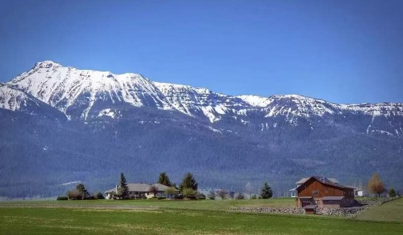 Wallowa Mountains: Snow-capped Peaks & Green Pastures
