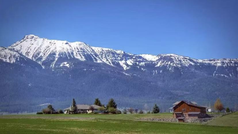 Wallowa Mountains: Snow-capped Peaks & Green Pastures