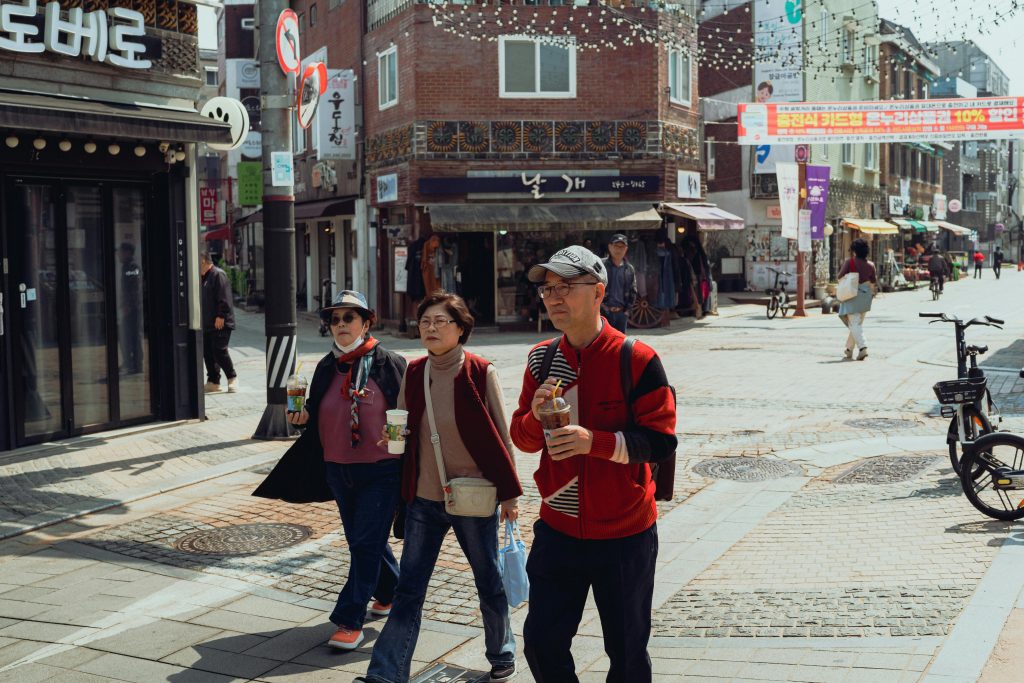 Friends exploring a city, experiencing health benefits of travel