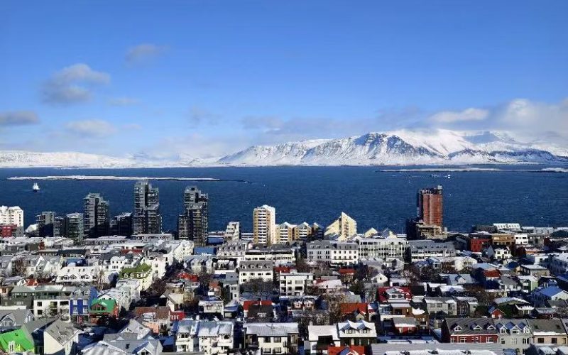 Reykjavik, Embraced by Snow-Capped Mountains and the Atlantic