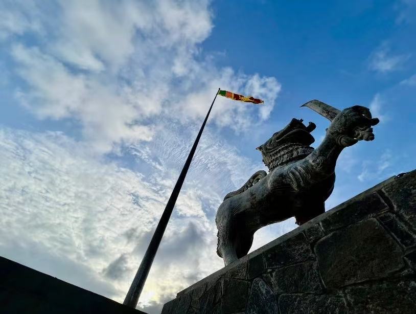Beneath Cloudy Sky, Lion & Flag Recount Island’s History
